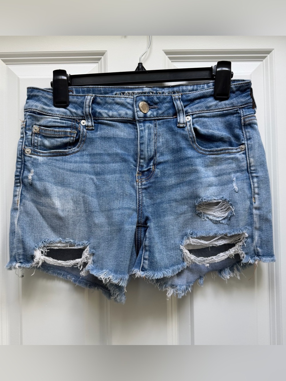 American Eagle cutoff distressed denim midi shorts medium wash 10 stretch